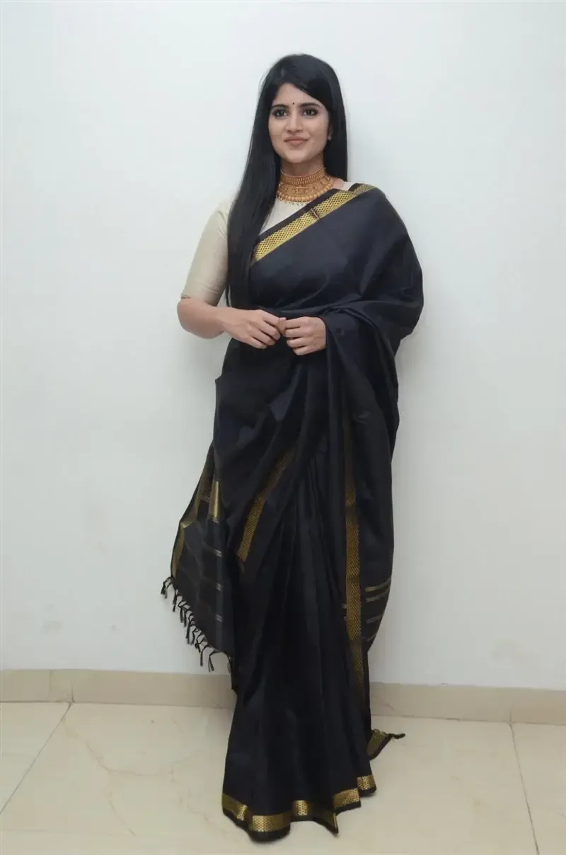 Megha Akash in Black Saree at Manu Charitra Telugu Movie Trailer Launch